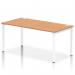 The image shows a sleek and modern Dynamic Bench Desking Impulse Bench Single Row 1600 with a white frame. The office bench desks surface is made of oak, giving it a beautiful natural look. It is perfect for a contemporary workspace.