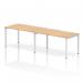 The picture show a dynamic bench desking impulse bench with a single row for 2 people. The white frame and maple office bench desk give a modern and professional look.