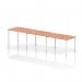 This photo captures a sleek and modern office bench desk with a white metal frame and a warm beech-colored top. The dynamic design allows for 3 people to sit comfortably in a single row, making it ideal for collaborative workspaces. 