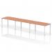 This image features a sleek and modern Dynamic Bench Desking Impulse Bench in a single row, accommodating 3 people. The bench has a white frame and is topped with a beech finish, creating a professional and efficient workspace.