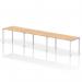 This picture features a modern and stylish white bench desk with a maple finish, designed for a single row of 3 people. The dynamic bench desking creates a functional and sleek workspace, perfect for any office environment.