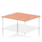 This image features a sleek and modern white frame office bench desk with a beautiful beech finish. Its dynamic design allows for two people to work comfortably on the spacious 1800mm surface, making it perfect for collaborative projects. This ergonomic bench desk is sure to enhance any professional workspace.