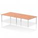 This photo features a modern and sleek Dynamic Bench Desking Impulse Bench B2B for 4 people, with a 1800 silver frame and a stylish beech desk. The simple and contemporary design would enhance any office space.