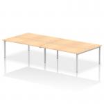 This photo captures a sleek and modern 4-person office bench desk from the Dynamic Bench Desking Impulse Bench B2B collection. The silver frame adds a touch of sophistication, while the maple desk surface provides a warm and inviting feel. Its clean lines and open design create a dynamic workspace for any team.