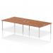 This image features a sleek and modern dynamic bench desking system, with a silver frame and a beautiful walnut finish. It can accommodate four people and measures 1800 in length. Perfect for any professional office setting.