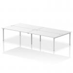 A photo of the Dynamic Bench Desking Impulse Bench B2B 4 Person with a 1800 silver frame would show a modern and sleek office desk. The white finish and 4 person capacity make it ideal for a collaborative and efficient work environment. The sturdy silver frame provides stability and the dynamic design adds a touch of style to any office space.