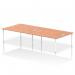 In the photograph, there is a dynamic bench desking set-up with an Impulse Bench B2B configuration. It can accommodate 4 persons and has a 1800 white frame. The office bench desk is made of beech and is labeled as IB00406.