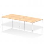 The picture shows a modern and versatile office bench desk that accommodates 4 persons. Its white frame and maple top exude a sleek and dynamic feel, making it a perfect addition to any contemporary workplace. With its impulse design, this bench desk is sure to bring energy and productivity to any team.