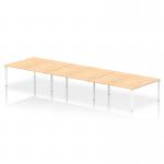 The photo shows a dynamic bench desking setup with Impulse Bench B2B, comfortably fitting 6 people. It features a sturdy white frame office bench desk with a maple surface, designed for a modern and efficient workspace.