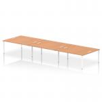 The dynamic bench desking that is Impulse Bench B2B consists of a spacious 6-person configuration with a sleek white frame and a sturdy oak desktop. This office bench desk, with its IB00421 model, appears modern and professional, perfect for any collaborative workspace.