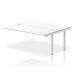 The photograph shows a modern, sleek Dynamic Bench Desk with Add On Units. The silver frame and white surface create a professional look, perfect for any office space.