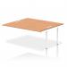 The picture shows a set of sleek, modern bench desks with a white metal frame and a desktop made of oak. The desks have add-on units and an extension kit, making them versatile for any office space. The design exudes a sense of dynamism and efficiency, perfect for a productive workplace.