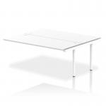This photo features a spacious, sleek white frame office bench desk with dynamic bench desk add-on units and an impulse bench B2B extension kit attached. The clean design and versatile layout make it a perfect fit for any modern workspace.