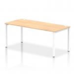 This photo features a sleek and modern Dynamic Bench Desking Impulse Bench Single Row in white, with a 1800mm length and maple desktop. The white frame adds a clean and contemporary touch to this office bench desk.