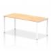 This photo features a sleek and modern Dynamic Bench Desking Impulse Bench Single Row in white, with a 1800mm length and maple desktop. The white frame adds a clean and contemporary touch to this office bench desk.