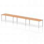 The dynamic bench desking features a sleek silver frame and a row of comfortable oak benches that can accommodate up to three people. Perfect for any modern office setting, this desk promotes collaboration and productivity.