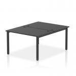 The Dynamic Bench Desking Impulse Bench B2B is a sleek and modern 2-person bench desk with a black frame and stunning black finish. The design is perfect for any office setting, providing a functional and stylish workspace for two individuals. The clean lines and dynamic shape of the desk create a professional and efficient work environment.