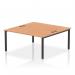 This image shows a sleek and modern office bench desk, with a 2-person setup and a black frame. The desk is made of oak and has a dynamic quality, perfect for a professional and collaborative work environment.