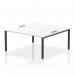 The photo shows a sleek and modern Dynamic Bench Desking Impulse Bench, specifically the B2B 2 Person 1600 Black Frame Office Bench Desk. The desk has a white top and is surrounded by a black frame, giving it a professional and elegant look. This desk is great for shared workspaces and promotes collaboration.