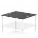 A professional and sleek white frame office bench desk with a dynamic design. This spacious 2 person desk features a black IB00514 impulse bench, perfect for modern workspaces.