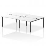 The photo features a sleek and modern Dynamic Bench Desking Impulse Bench with a black frame and a spacious 4-person design. The 1200 white office bench desk highlights a clean and professional workspace suitable for any business.