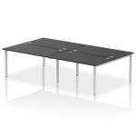This photo features a sleek and modern Dynamic Bench Desking Impulse Bench B2B suitable for a 4 person office. The bench has a stylish silver frame and a smooth black desk surface.