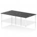 A modern, functional office space filled with four sleek black bench desks, each with a white frame and a spacious 1400 surface area. The dynamic bench desking makes for an efficient and stylish work environment.