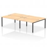 The picture shows a modern office with a sleek black frame Dynamic Bench Desking Impulse Bench B2B, accommodating 4 people with a spacious 1400 desk. The maple surface adds warmth to the clean and efficient design. Perfect for collaboration and productivity in a contemporary workspace.