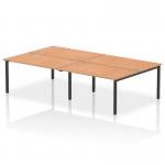 The bench desking set up is designed for 4 people and has a sleek black frame. The office desk is made of oak and is perfect for any modern corporate space. This dynamic bench desk provides a functional and stylish work area for collaborative tasks.