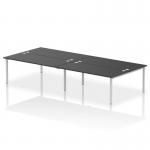 This photo showcases a sleek and modern Dynamic Bench Desking Impulse Bench B2B, featuring a 4 person configuration with a silver frame and black office bench desk. The 1800 size is perfect for any office workspace.
