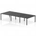 The Dynamic Bench Desking Impulse Bench B2B 6 Person has a sleek and modern design, featuring a long black frame and six individual desk spaces. The desks are equipped with ample storage and workspace, making it a versatile option for any office setting. With its stylish appearance and functional design, this bench desk is sure to enhance any workspace with its practicality and aesthetics.