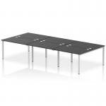 The dynamic bench desking photo captures a sleek, modern design with a silver frame and black surface. It boasts a spacious layout that comfortably seats 6 people, making it perfect for collaborative workspaces. The versatility of this impulse bench makes it an ideal choice for any office setting.