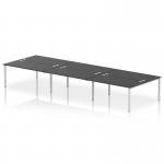 The photo shows a modern and versatile office setup with a dynamic bench desking system, specifically the Impulse Bench B2B for 6 people. It features a sleek silver frame and a black bench desk, creating a sleek and professional look.