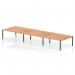 The dynamic bench desking Impulse Bench B2B can comfortably fit 6 persons. It has a sleek black frame and a sturdy oak desk, providing a professional look for any office space.