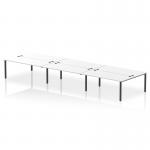 This photo showcases a sleek and modern office setup with a dynamic bench desking system. The Impulse bench desk features a black frame and can accommodate up to 6 people. The 1800 size offers ample workspace, while the white finish adds a touch of sophistication.