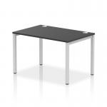 A modern office space featuring the sleek and stylish Dynamic Bench Desking Impulse Bench Single Row 1200. Its silver frame and black desk create a dynamic and contemporary vibe, perfect for a professional workspace.