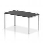 The photo shows a sleek, modern work desk with a single row of benches. The silver frame adds a touch of elegance, while the black top provides a professional look. The design is dynamic, perfect for a bustling office environment.