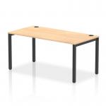 The Dynamic Bench Desking Impulse Bench Single Row 1600 features a sleek black frame and a spacious maple desk top. The modern, dynamic design of this office bench desk adds a touch of sophistication to any workspace.
