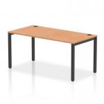 This image showcases a sleek and modern dynamic bench desk designed for office spaces. The black frame and oak surface create a bold and professional look, while the single row layout allows for efficient use of space. Perfect for collaborative work environments.