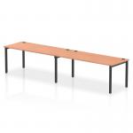 This image shows a modern and sleek Dynamic Bench Desking Impulse Bench Single Row with room for 2 people. The black frame adds a touch of sophistication to the office bench desk, while the beech finish brings warmth to the space. Ideal for a collaborative work environment.