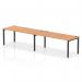 The Dynamic Bench Desking Impulse Bench has a sleek and modern design with a black frame and a beautiful oak desk. Its single row setup comfortably accommodates two people, making it ideal for any office space.
