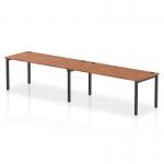 A modern and sleek office setup can be achieved with this Dynamic Bench Desking Impulse Bench. Featuring a stylish black frame and a 2-person 1800 walnut desk, this single row bench adds an element of functionality and sophistication to any workspace.