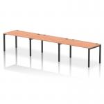 This picture shows a sleek and modern Dynamic Bench Desking Impulse Bench. It features a single row, accommodating 3 people. The black frame contrasts the rich beech color of the desk, creating a stylish and functional piece for any office setting.