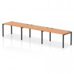 The dynamic bench desking impulse bench boasts a sleek design with a black frame and a 1400 oak office desk. This single row 3-person bench enhances collaboration and productivity while adding a touch of modernity to any workspace.