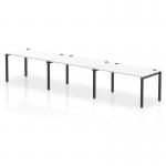 This photo features a sleek and modern Dynamic Bench Desking Impulse Bench Single Row, accommodating 3 people at once. It boasts a 1400mm width, a black frame, and a white office bench desk, making it a stylish addition to any workspace.
