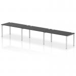 This photo features a modern and sleek Dynamic Bench Desking Impulse Bench Single Row, designed for 3 people. The bench desk has a stylish silver frame and a black surface, making it a functional and attractive addition to any office space.