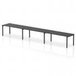 The image shows a sleek and modern dynamic bench desking setup with a single row of three person desks. The black frame adds a touch of sophistication to the office space, while the black bench desks provide ample workspace.