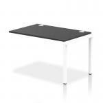 The photograph shows a set of dynamic bench desk add-on units, with a single row extension kit measuring 1200mm. The frame is a sleek white color, while the desk itself is a functional black. This office bench desk is perfect for creating a collaborative work environment.