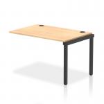 This picture features dynamic bench desk add on units in a single row extension kit with a black frame. The bench desk is made of maple wood and has a sleek and modern design. It is perfect for any office setting and can easily accommodate multiple employees. The black frame adds a touch of sophistication to the overall look.