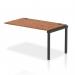This photograph showcases a dynamic bench desk with add on units and a single row extension kit. The sleek black frame and walnut finish give it a modern and professional look, perfect for any office space.